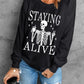 Skull Graphic Round Neck Long Sleeve Sweatshirt