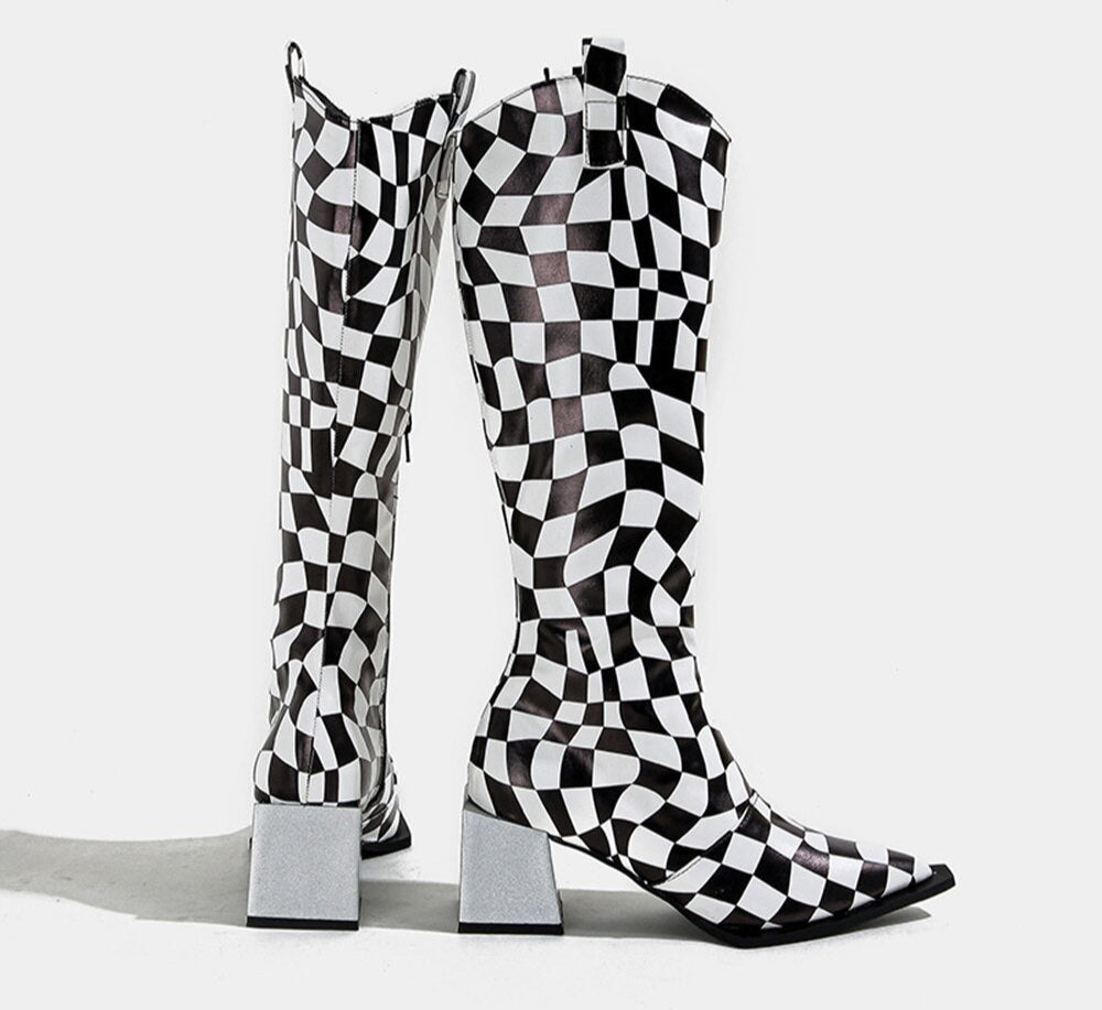Black and white checkered knee-high boots on a light gray background