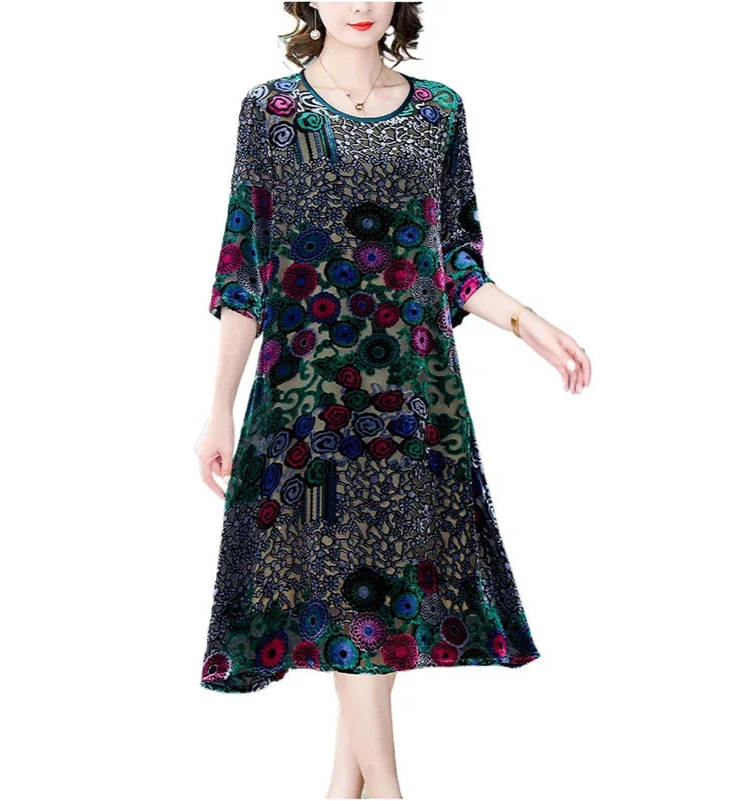 Woman wearing a colorful floral dress on a white background