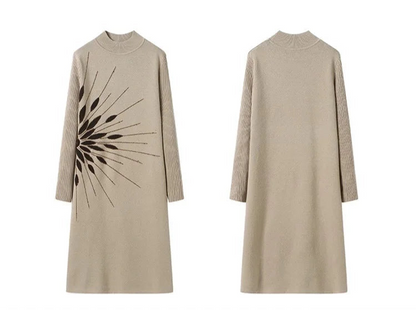 Beige dress with black abstract pattern on a white background