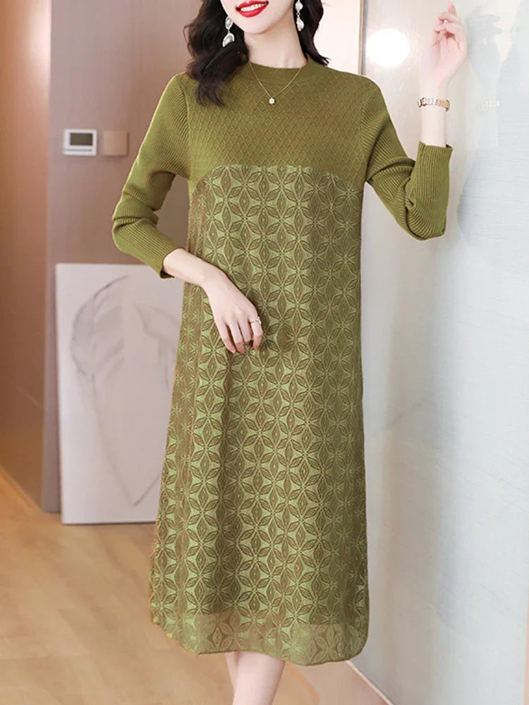 Woman wearing a green dress with a subtle pattern in an indoor setting