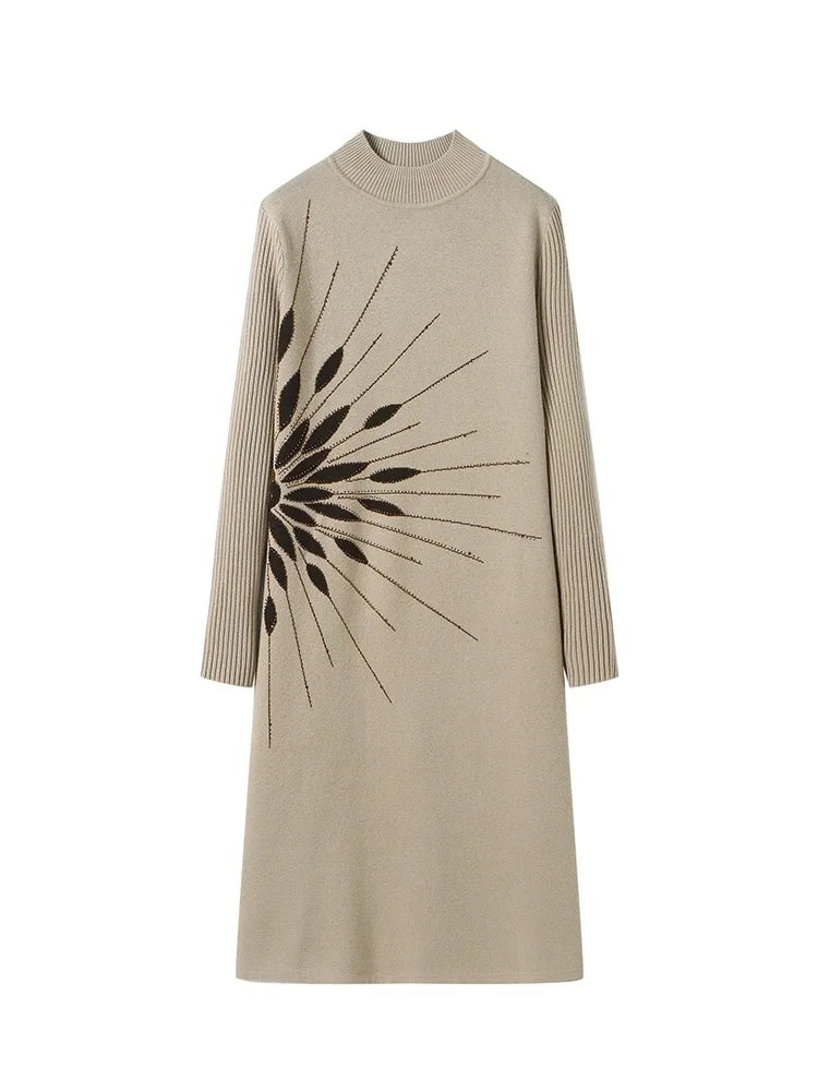 Beige knit dress with black abstract pattern on a white background