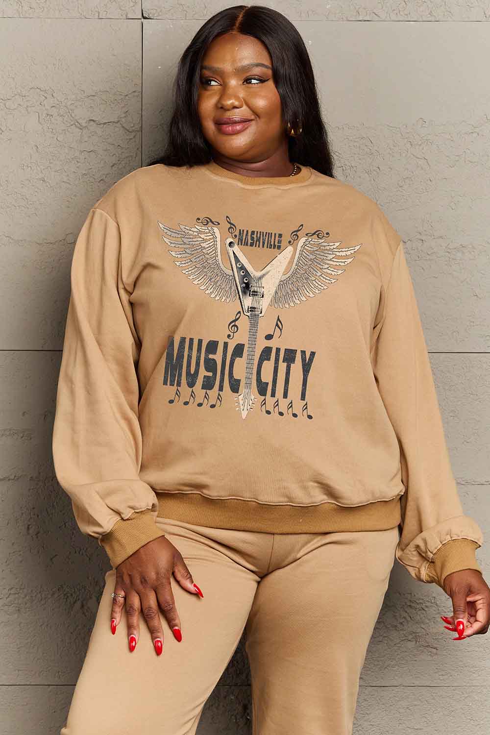 Round Neck Dropped Shoulder MUSIC CITY Graphic Sweatshirt