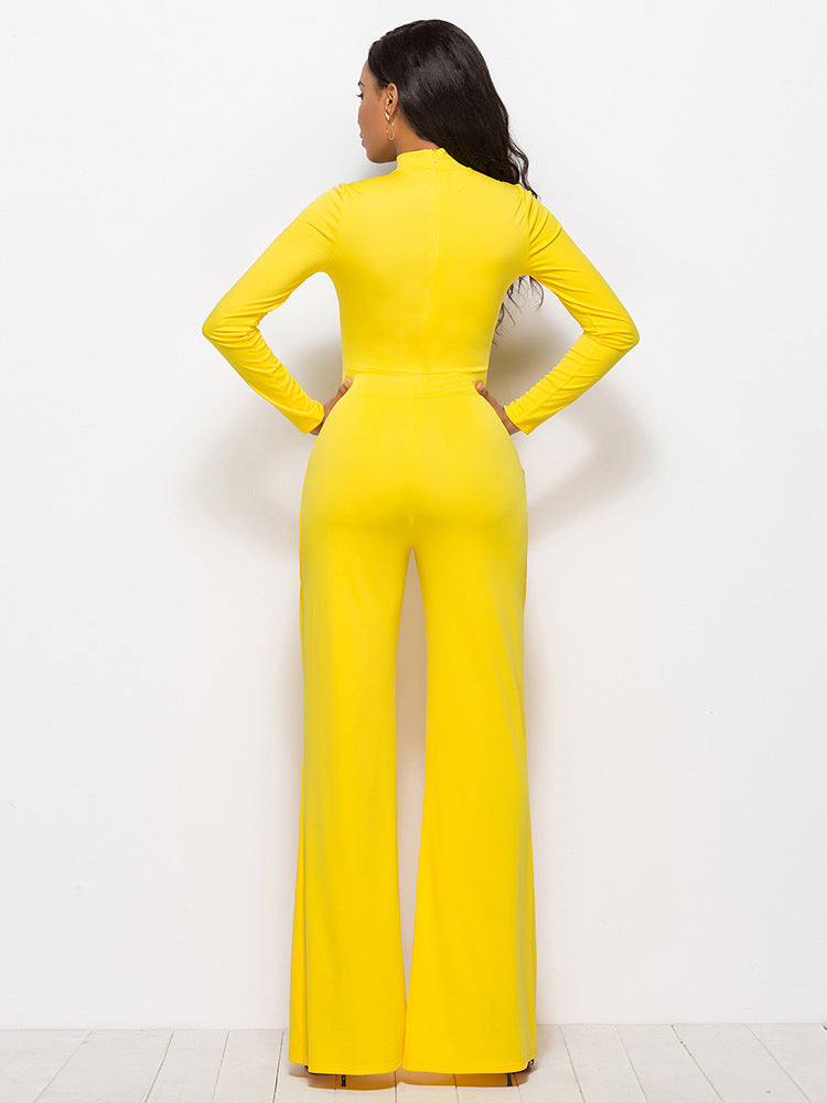 Woman wearing yellow mock neck wide leg jumpsuit