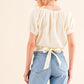 And The Why Back Waist Tie Cropped Blouse