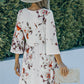 Woman wearing white floral print A-line Mini Dress