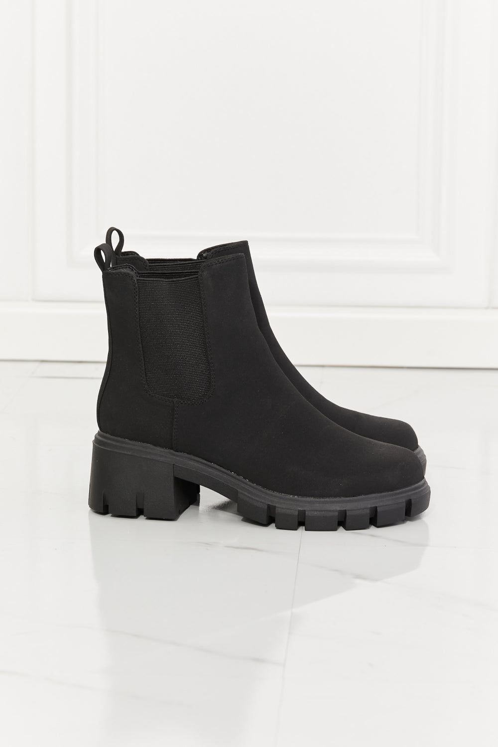Lug Sole Chelsea Boots in Black