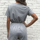 Woman wearing Gray Buttoned & Drawstring Romper