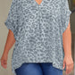 Plus Size Printed Notched Neck Half Sleeve Top