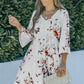 Woman wearing white floral print A-line Mini Dress