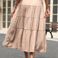 Woman wearing Khaki Tiered Midi Skirt