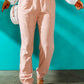 Woman in Pink Paperbag Waist Joggers