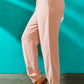 Woman in Pink Paperbag Waist Joggers