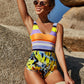 Woman wearing multicolor mixed print one-piece swimsuit