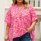 Plus Size Printed Notched Neck Half Sleeve Top